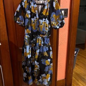 Floral Black Dress with Blue and Yellow Gold Accents pockets